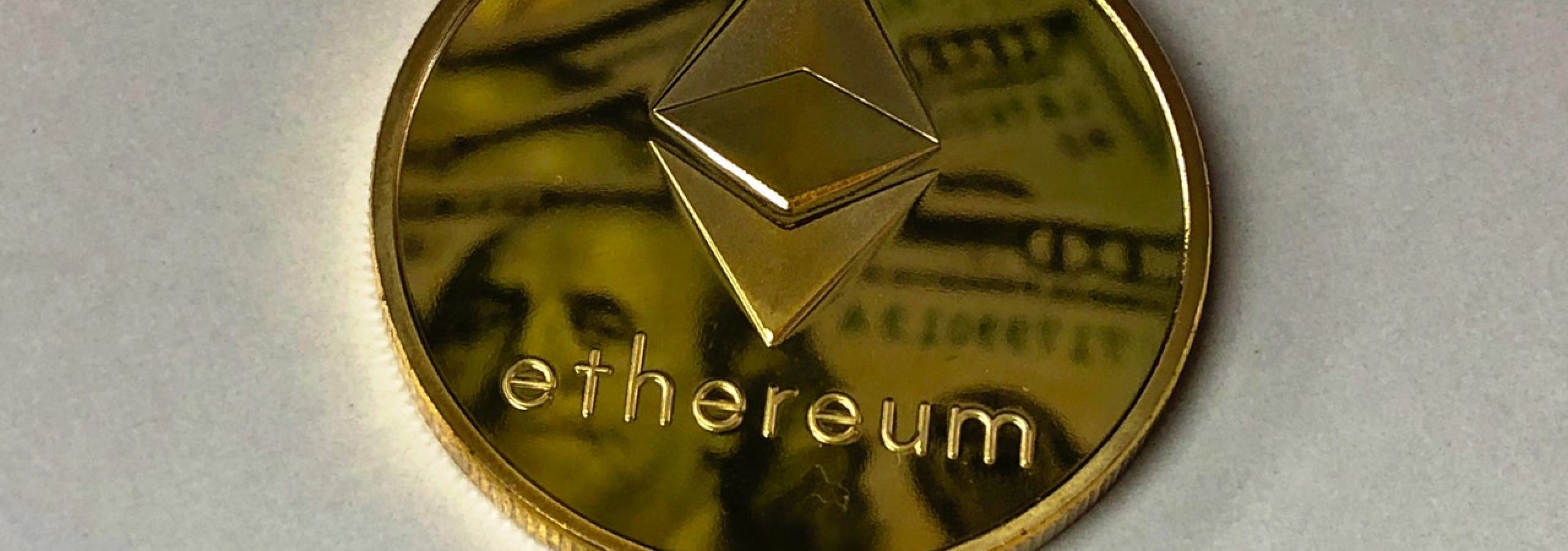photo of a minted ethereum crypto coin