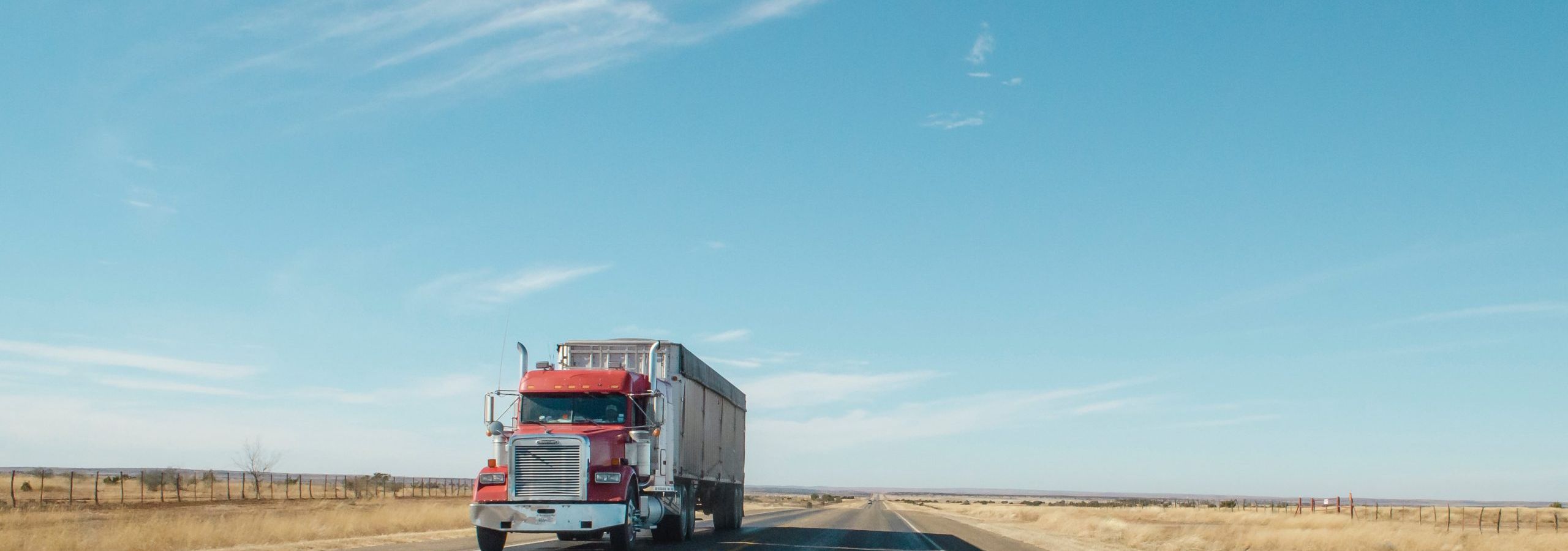 Truck driving down the road