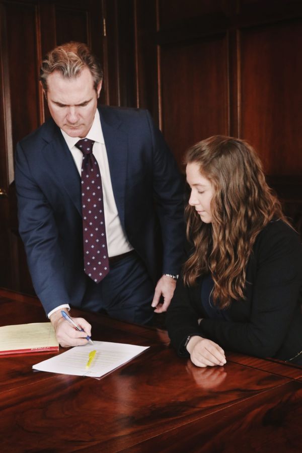 photo of attorney Joe Lyon reviewing road construction cases