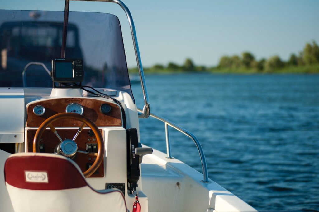 photo of a motor boat in a lake